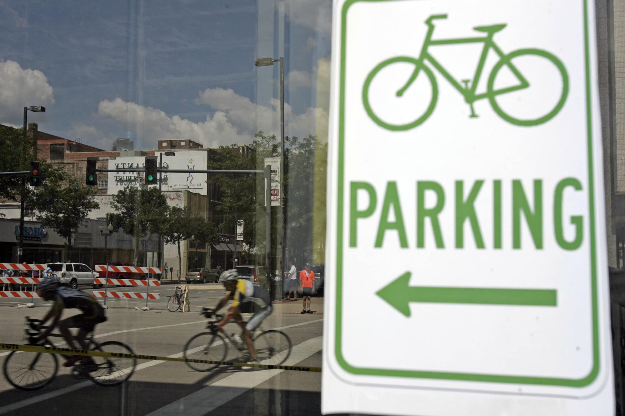 Cyclists race through downtown in a criterium