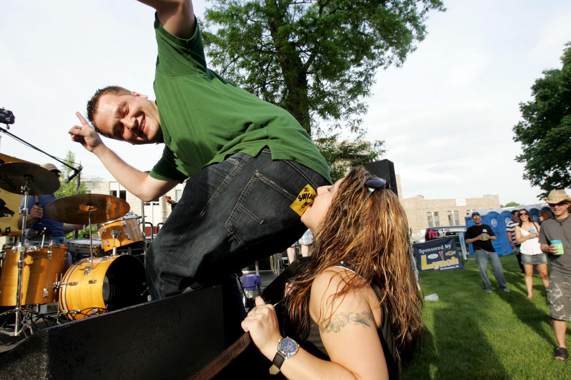 Performer connects with crowd at outdoor summer festival
