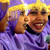 Women from Oman perform a traditional song and dance during the Smithsonian's annual Folklife Festival held on Washington, D.C.'s National Mall June 30th, 2005. Oman, a country located in the Middle East, was one of many countries spotlighted during this year's "culturally broadening" event, which was expected to attract nearly one million visitors.