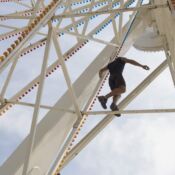A worker sets up the Giant Wheel Ferris wheel on the Elkhart County 4-H fairgrounds in Goshen, Indiana on Wednesday July 16, 2008.